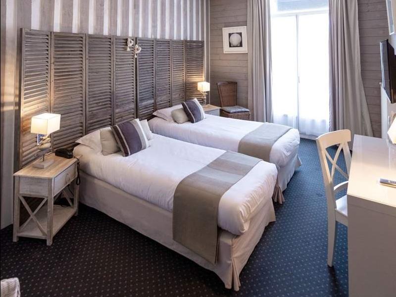 Cit\'Hotel Normandy