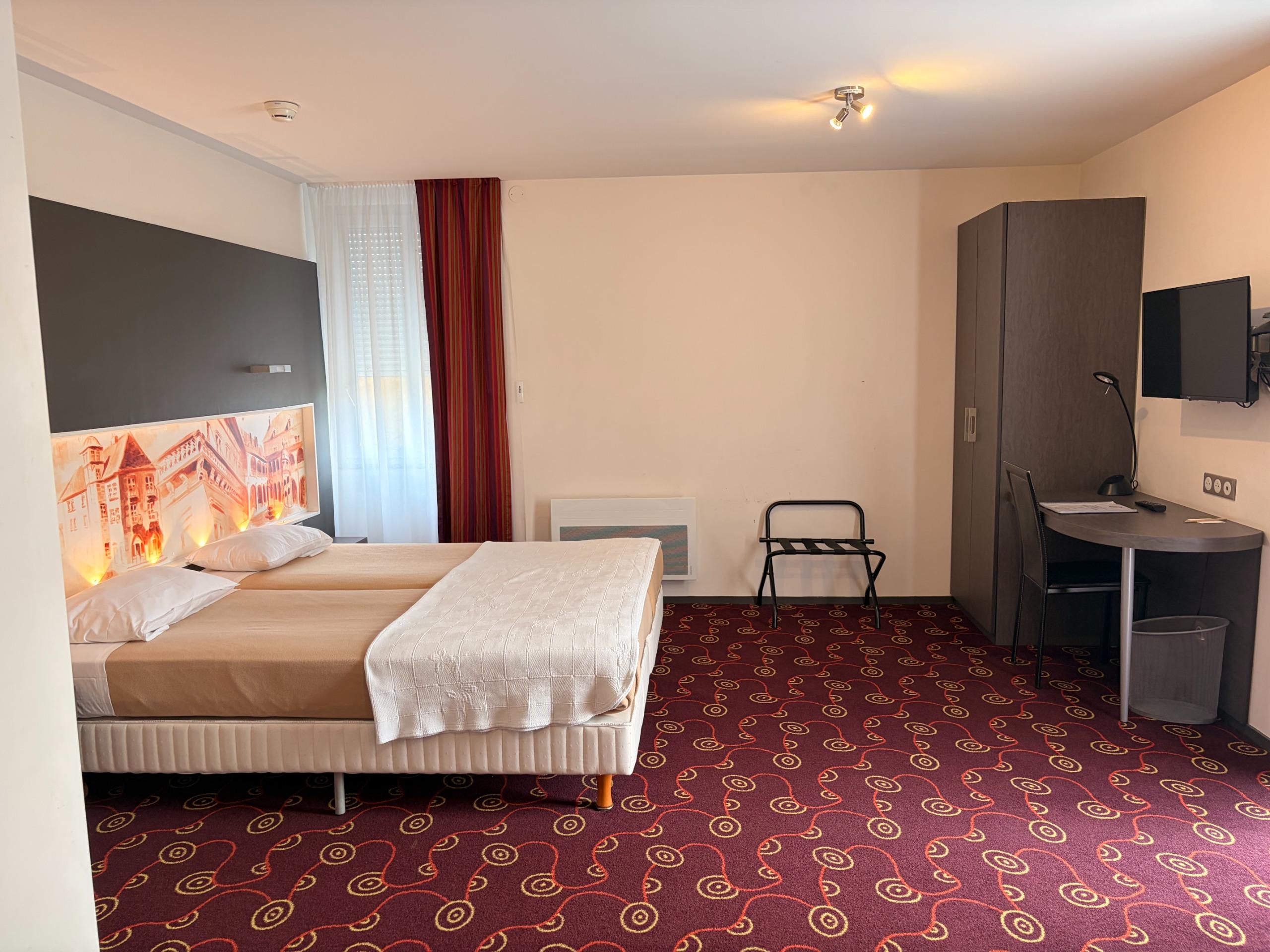 Cit\'Hotel de la Cloche